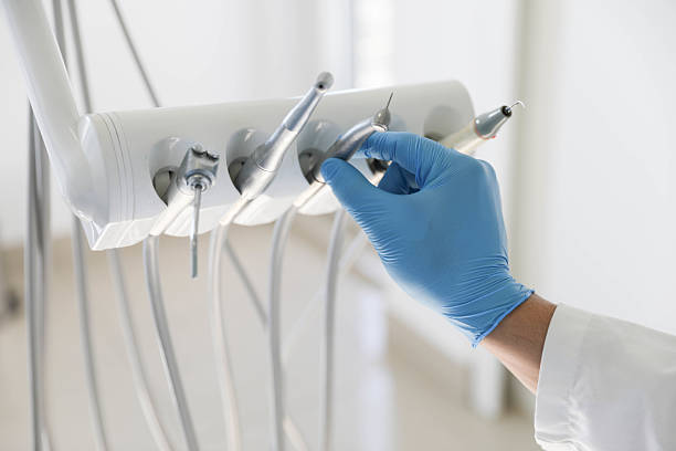 Professional Tooth Extraction technician working in Love County County, OK